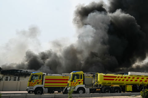 A plume of smoke rises from a reported Iranian strike in the industrial district of Doha on March 1, 2026.  