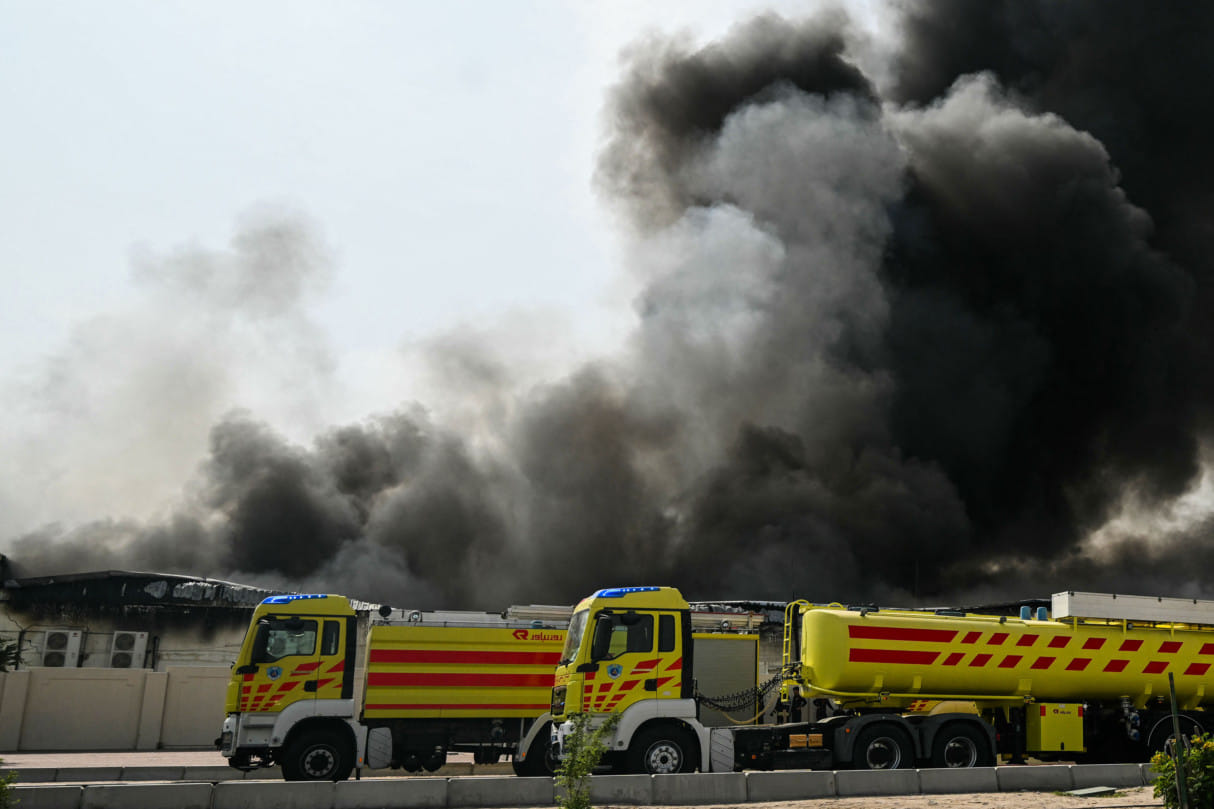 A plume of smoke rises from a reported Iranian strike in the industrial district of Doha on March 1, 2026.  