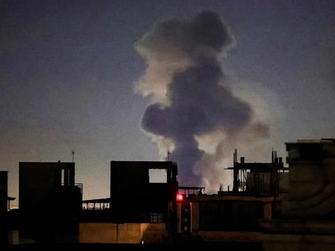 A plume of smoke rises after a strike on Tehran on March 4, 2026. 