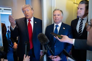 President Donald Trump speaks to members of the media traveling on Air Force One while heading to Miami on March 7, 2026 as United States Special Envoy to the Middle East Steve Witkoff and US Secretary of War Pete Hegseth listen in.