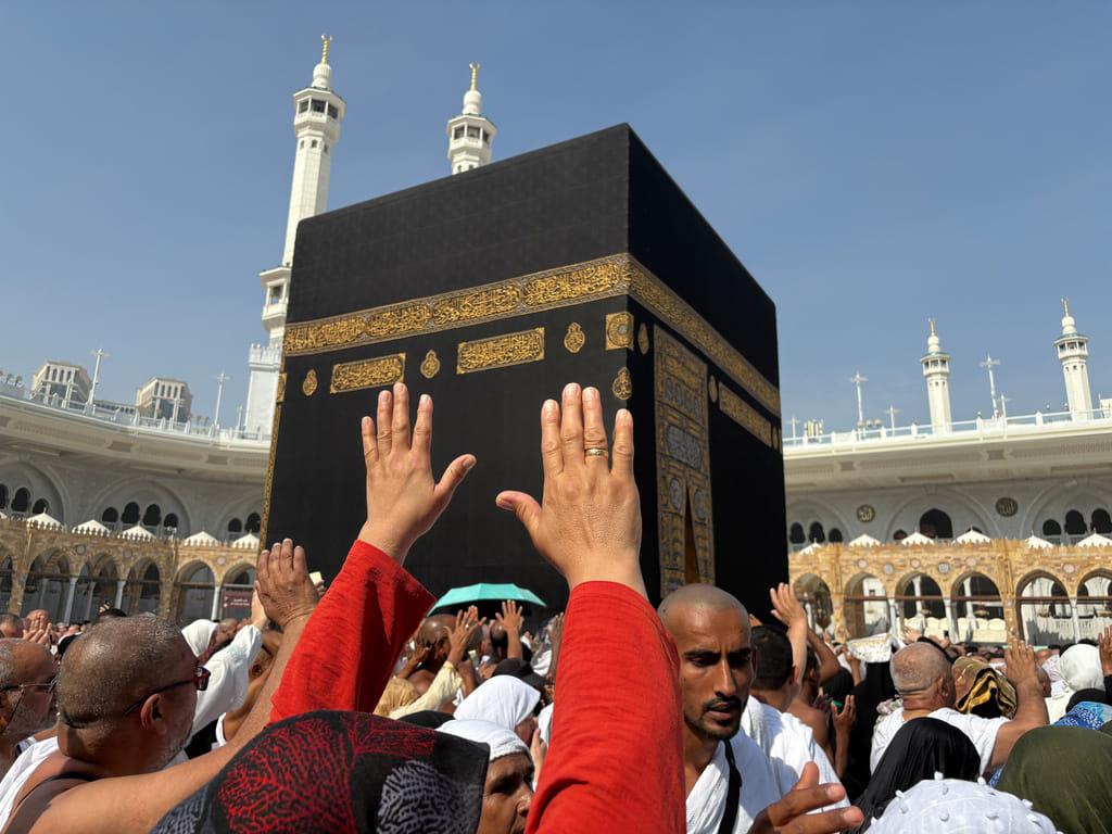 Muslim pilgrims pray as they circumambulate the Kaaba, the cubic building at the Grand Mosque, during the minor pilgrimage, known as Umrah, in the Muslim holy city of Mecca, Saudi Arabia.