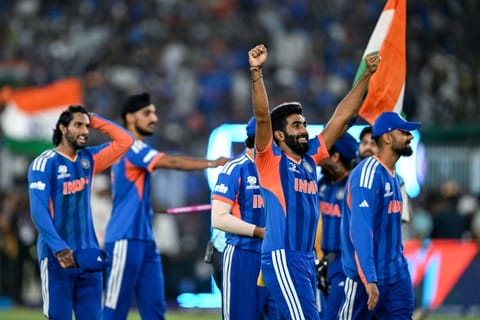 India's players celebrate after winning the 2026 ICC Men's T20 Cricket World Cup final match against New Zealand at the Narendra Modi Stadium in Ahmedabad on March 8, 2026.