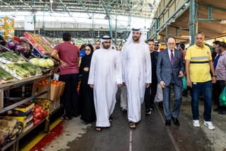 Abdulla bin Touq Al Marri, UAE Minister of Economy and Tourism, along with authorities, during an inspection tour at the Fruit and Vegetable Market in Al Aweer, Dubai. 