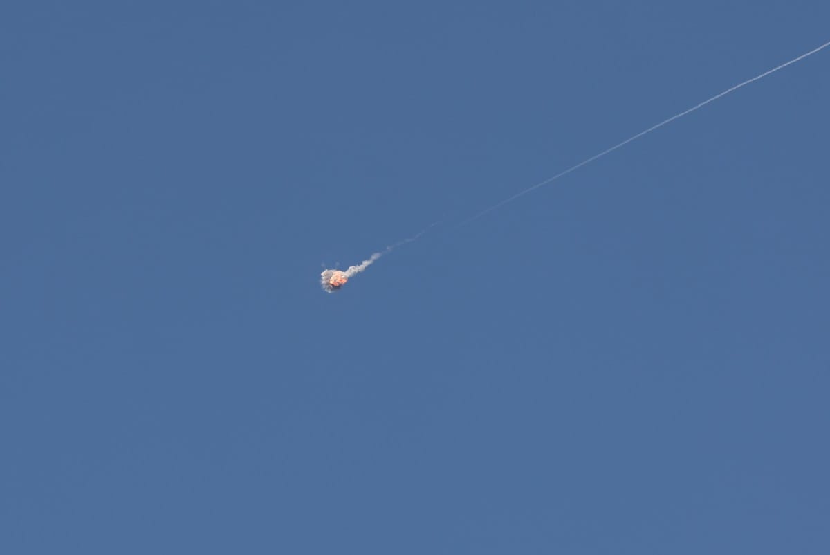 Rocket trails are seen in the sky above the Israeli coastal city of Tel Aviv amid a fresh barrage of Iranian missile attacks. File photo taken on March 9, 2026.