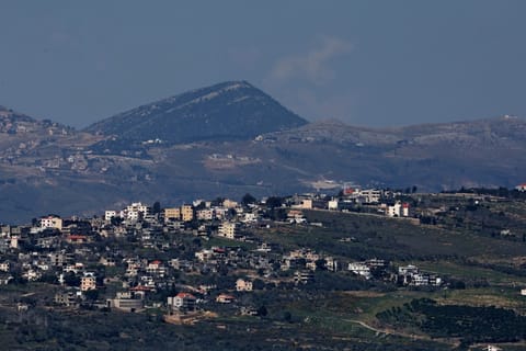Smoke rises from an explosion following Israeli bombardment on southern Lebanon near the border with northern Israel on March 10, 2026.