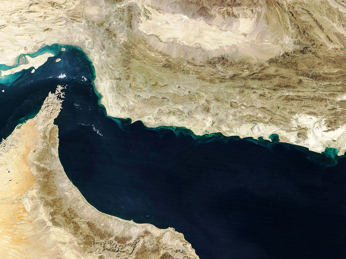 This handout natural-colour image acquired with MODIS on NASA’s Terra satellite taken on February 5, 2025 shows the Gulf of Oman and the Makran region (C) in southern Iran and southwestern Pakistan, and the Strait of Hormuz (L) and the northern coast of Oman (bottom).