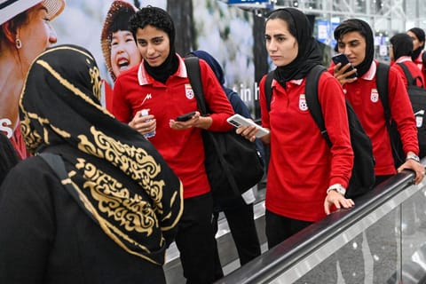 Members of Iran's women's football arrive at the Kuala Lumpur International Airport after taking part in the AFC Women’s Asian Cup Australia 2026 tournament in Australia