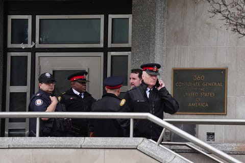 Toronto police officers investigate outside the U.S. consulate in Toronto on Tuesday March 10, 2026.  