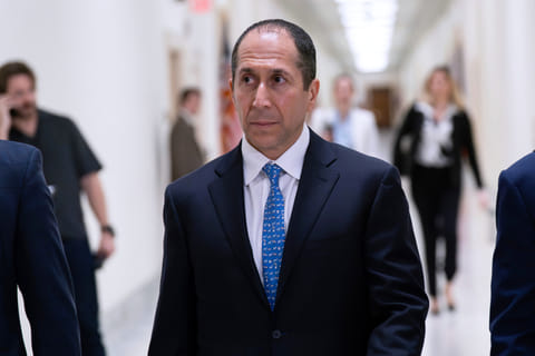 Richard Khan, Jeffrey Epstein's accountant and co-executor of his estate, arrives for his deposition before the House Oversight Committee on Capitol Hill, Wednesday, March 11, 2026, in Washington. (AP Photo/Jose Luis Magana)