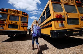 A student prepares to leave school, Aug. 13, 2014, southeast of Brookhaven, Mississippi. 