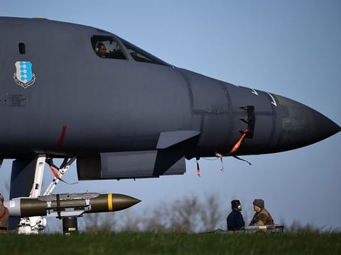 US Air Force personnel prepare Joint Direct Attack Munitions (JDAM) for a B-1 Lancer bomber at RAF Fairford in southwest England on March 14, 2026, as the base supports US defensive operations targeting Iranian missiles.