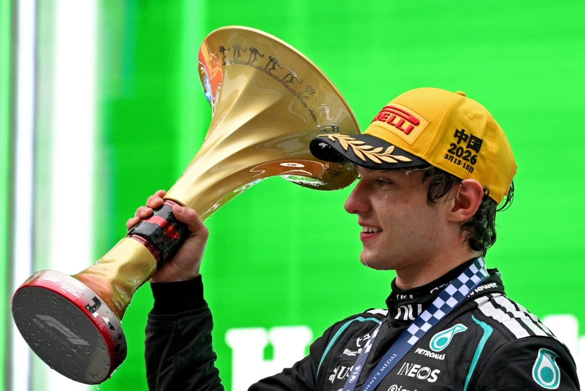 Winner Mercedes' Italian driver Kimi Antonelli celebrates on the podium after the Formula One Chinese Grand Prix at the Shanghai International Circuit in Shanghai on March 15, 2026.