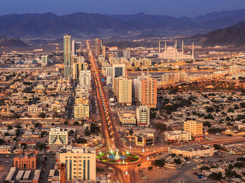 Fujairah contains blaze after suspected drone strike on industrial site.