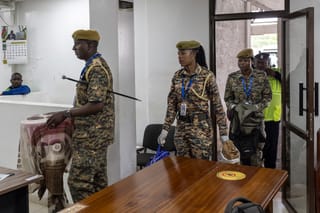 Kenya Wildlife Services wardens deliver exhibits of live ants confiscated from Chinese national, Zhan Kequn and his co-accused Kenyan, Charles Mwangi (both not in picture) to the Jomo Kenyatta International Airport (JKIA) law courts, before the accused arraignment to take a plea against charges of dealing in wildlife species contrary to laws regulating wildlife conservation after they we're found in possession of more than two thousand live ants intended to be trafficked internationally in Nairobi on March 17, 2026.