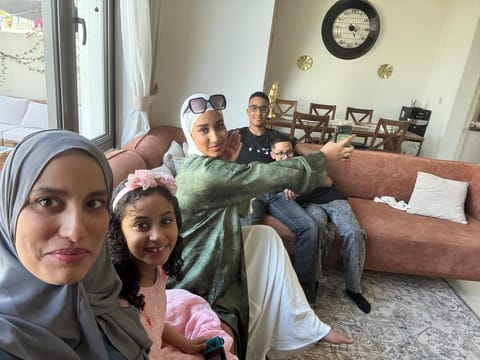 Inas Ali Zeidan (left) with her family. 