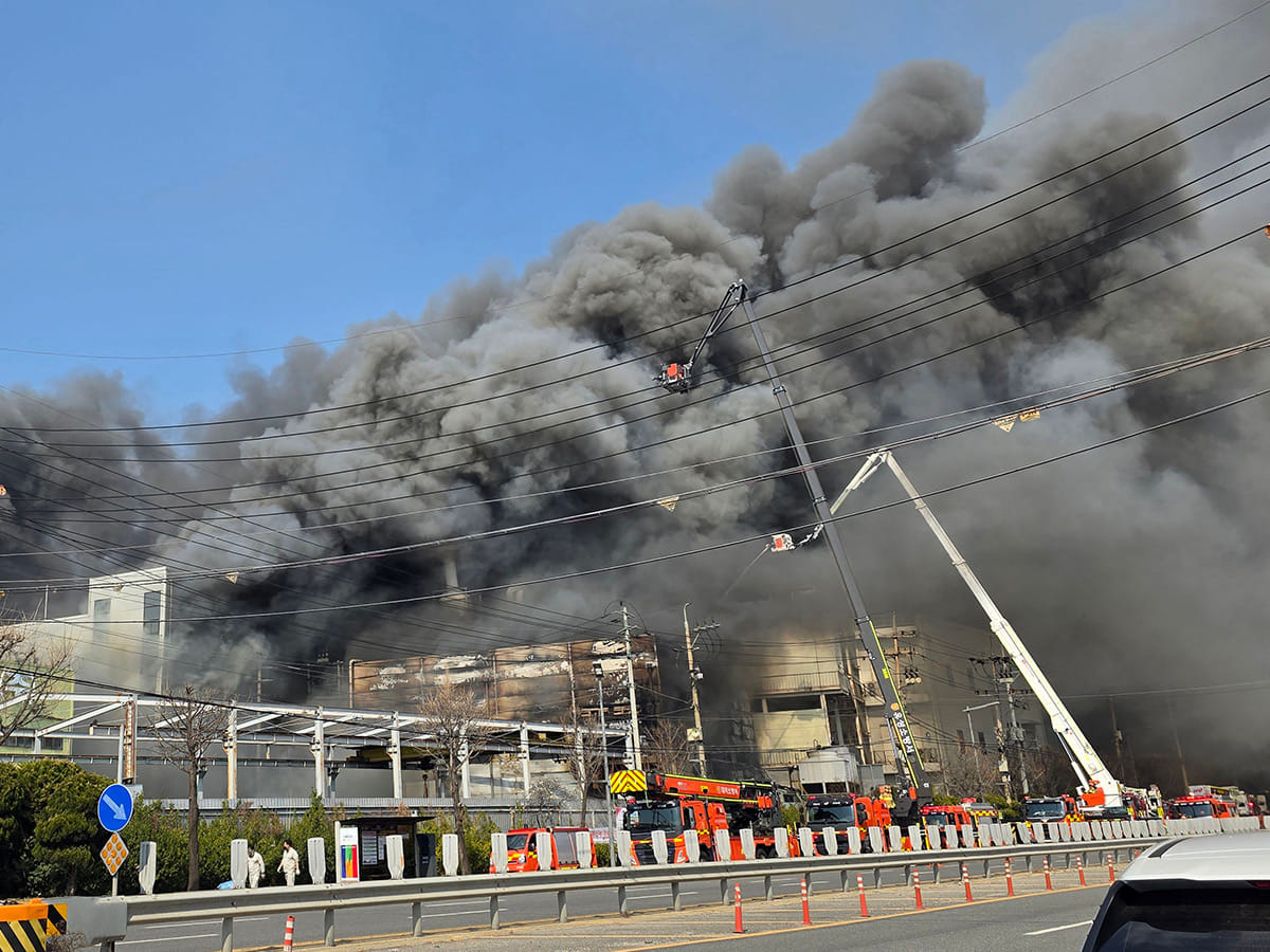 Heavy smoke rise following a fire at a car parts plant in Daejeon on March 20, 2026. A fire at a car parts plant in South Korea on March 20 seriously injured at least 21 people and left 14 others missing, authorities said. 