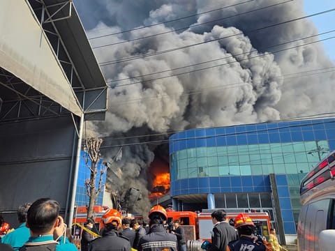 Some people were injured when they jumped from the building to escape.