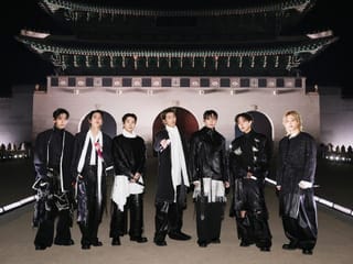 This handout photo taken on March 21, 2026 and provided by BIGHIT MUSIC / Netflix shows K-pop boy group BTS posing for their concert at Gwanghwamun Square in Seoul.