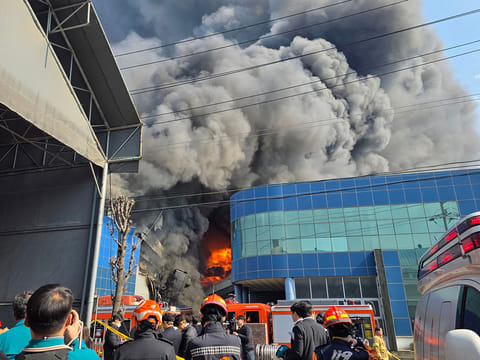 Heavy smoke rise following a fire at a car parts plant in Daejeon, in South Korea, on March 20, 2026. 