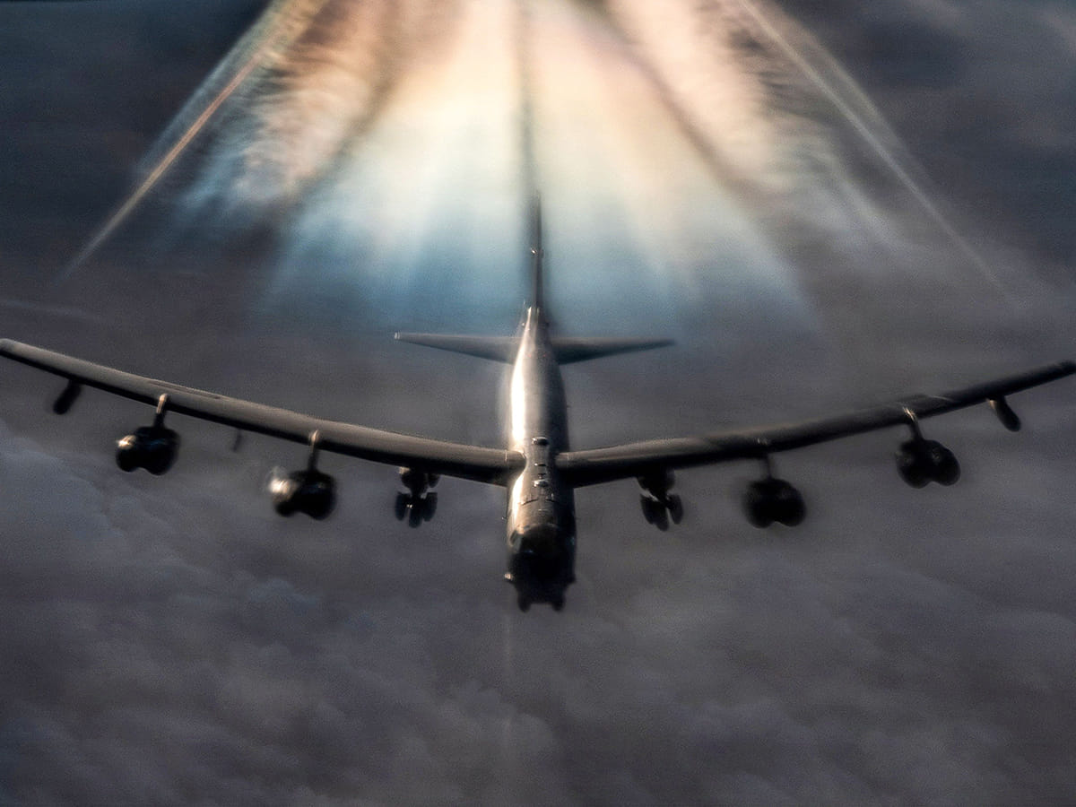 A US Air Force B-52H Stratofortress bomber aircraft prepares to refuel from a KC-135 Stratotanker aircraft during Operation Epic Fury over the US Central Command area of responsibility. 