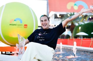 Aryna Sabalenka poses with the Butch Buchholz trophy after defeating Coco Gauff of the United States during the Women's Singles Final on Day 12 of the Miami Open Presented by Itau at Hard Rock Stadium on March 28, 2026 in Miami Gardens, Florida.