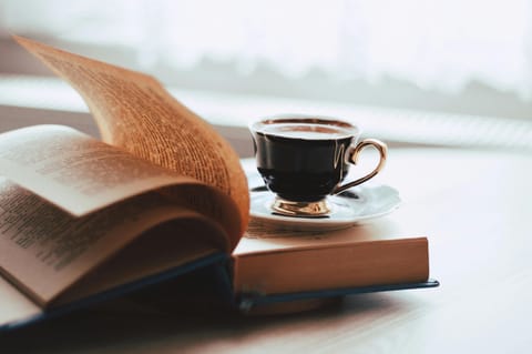 Coffee and a book to read at a cafe