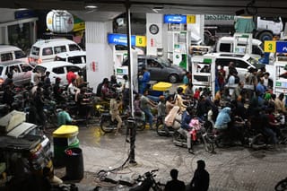 Clients queue at a gas station amid rising petrol prices in Karachi on April 3, 2026.