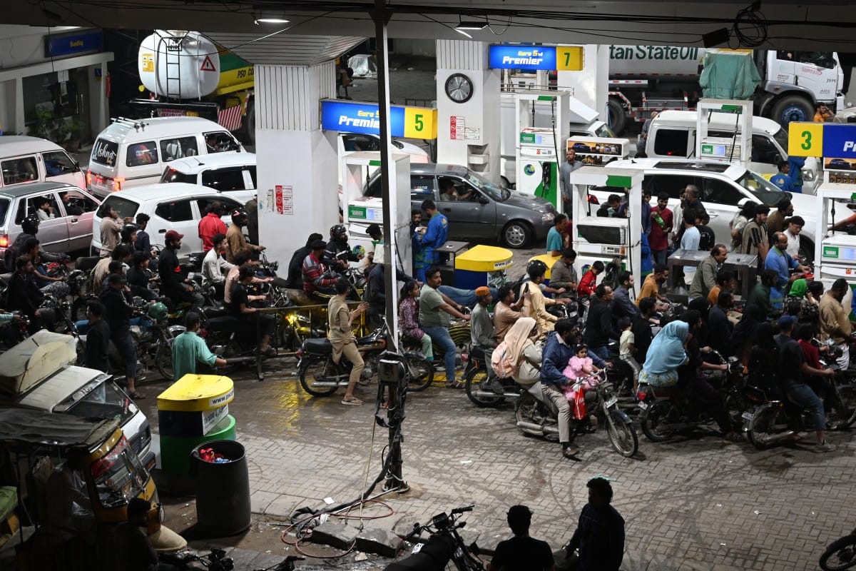 Clients queue at a gas station amid rising petrol prices in Karachi on April 3, 2026.