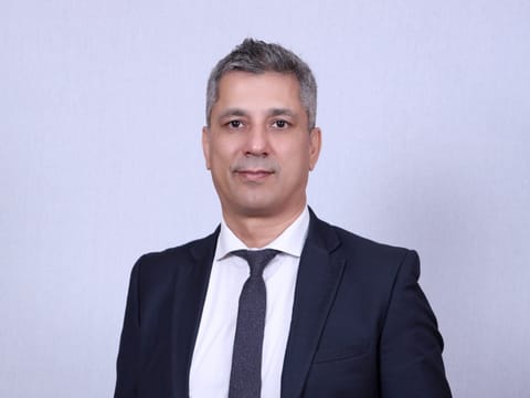 Mr. Sardana’s career is defined by navigating high-density rail environments. 