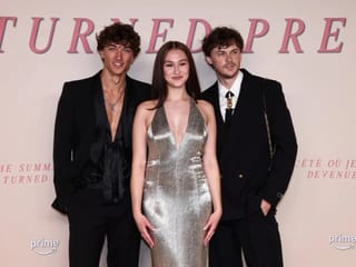 US actor Gavin Casalegno, US actress Lola Tung and US actor Christopher Briney on the red carpet upon arrival for the Special screening of the final episode of the serie "The Summer I turned pretty", in Paris, on September 17, 2025.