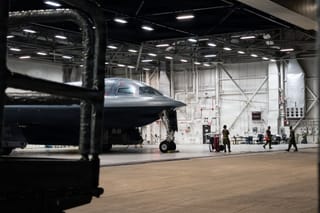 In this US Air Force handout photo released by US Central Command public affairs, US Airmen conduct preflight operations prior to a B-2 Spirit stealth bomber departing base in the US Strategic Command area of responsibility in support of Operation Epic Fury on March 29, 2026.