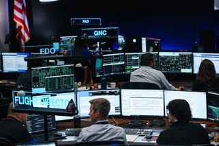 Artemis II flight controllers monitor the Orion spacecraft from the White Flight Control Room at Johnson Space Center in Houston, Texas, on April 6, 2026.