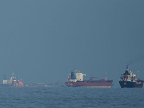  Oil tankers and cargo ships line up in the Strait of Hormuz 