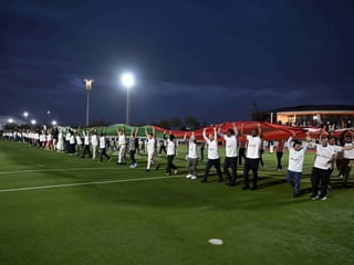 Watch: 64 nationalities lift 200kg UAE flag, set record