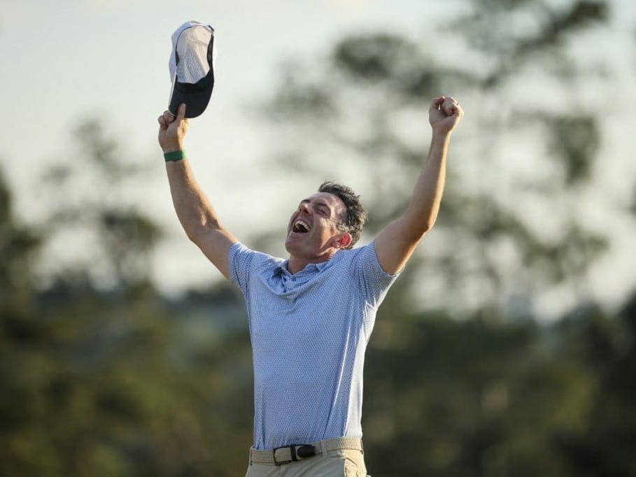 Rory McIlroy celebrates winning the 2026 Masters Tournament on the 18th green at Augusta National Golf Club 