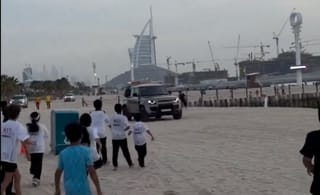 Watch: Mohammed bin Rashid surprises beachgoers at Kite Beach