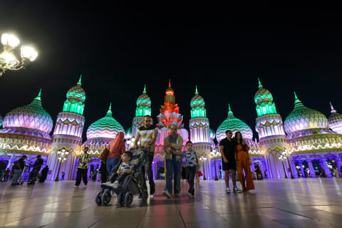 Visitors arrive during the night time at season 30 of Global Village which reopened after a month-long pause. 