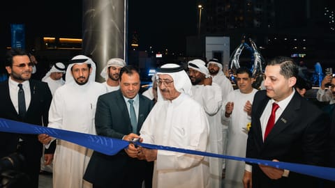 Sheikh Hasher Bin Maktoum Bin Juma Al Maktoum (second from right), Chairman of Dubai Media Incorporated, Mohamed Adib Hijazi (third from right), Chairman of HRE Development, and guests at the handover ceremony