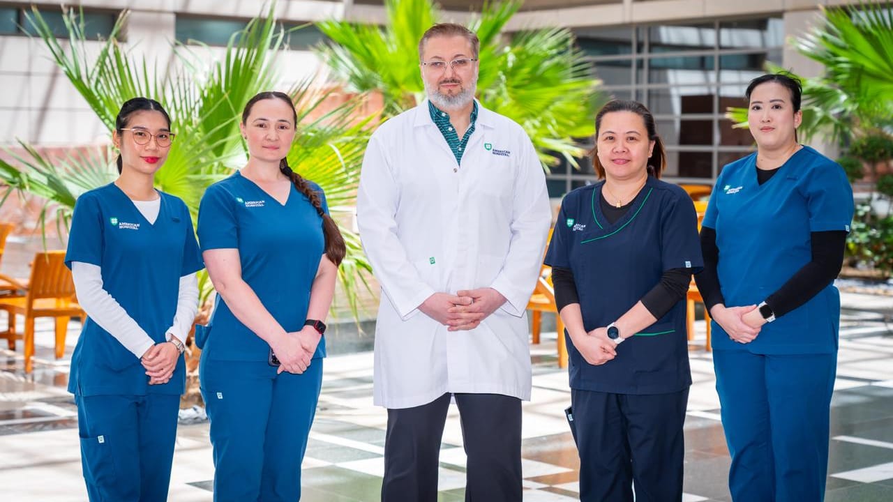 Dr Ayman Tarabishy. Consultant Physical Medicine and Rehabilitation, Brain Injury Medicine and Pain Medicine, with his team at American Hospital Dubai 