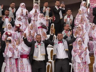 The ceremony, held last Friday in central Gaza, attracted large crowds of families, community leaders and representatives of local and international organisations, with organisers estimating attendance at around 20,000 people.