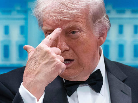 President Donald Trump gestures as he speaks in the James Brady Press Briefing Room at the White House after a shooting incident outside the ballroom at at the annual White House Correspondents' Association dinner in Washington.
