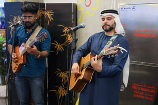 Mohamed Al Zarooni, Dubai-based Emirati singer-songwriter performing, along with his band Zarooni Sound Society at Neighbourhood Food Hall in Green Community Motor City. 
