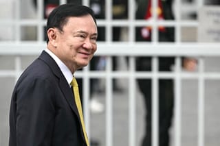 Thailand's former Prime Minister Thaksin Shinawatra arrives at the Supreme Court in Bangkok on September 9, 2025, ahead of a ruling on whether he properly served a prison term in 2023.