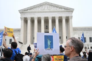 Members of the National TPS Alliance rally at the US Supreme Court in Washington, DC, on April 29, 2026.