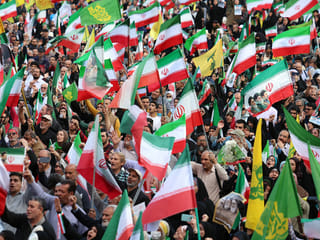 Iranians wave Iran’s national flags during a rally to show their solidarity and support to the new Iranian supreme leader Ayatollah Mojataba Khamenei in Tehran, on April 29, 2026. 