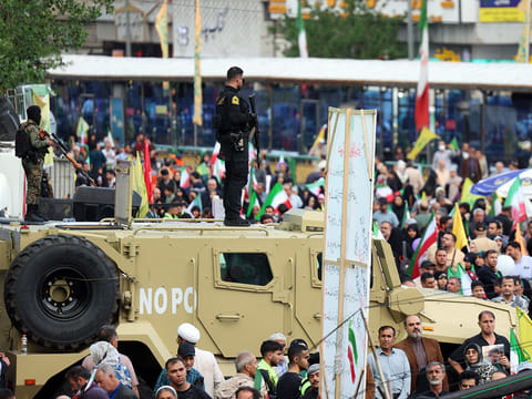 Iranian security forces stand guard during a rally to show solidarity and support to the new Iranian Supreme Leader Ayatollah Mojataba Khamenei in Tehran, on April 29, 2026.