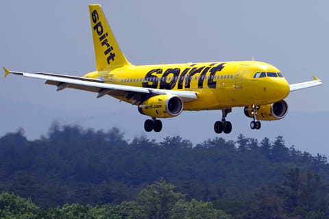FILE - A Spirit Airlines 319 Airbus approaches Manchester Boston Regional Airport for a landing, June 2, 2023, in Manchester, New Hamshire.