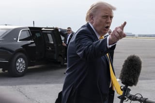 President Donald Trump speaks to journalists before boarding Air Force One at Palm Beach International Airport on May 2, 2026 in Palm Beach, Florida.