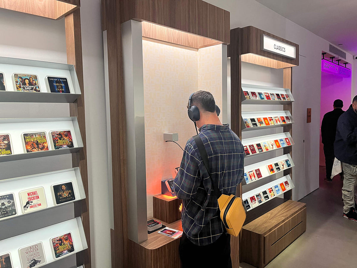 A customer shops at the Audible Story House in New York,. The pop-up store labelled as a "bookless bookstore" is dedicated to audiobooks.