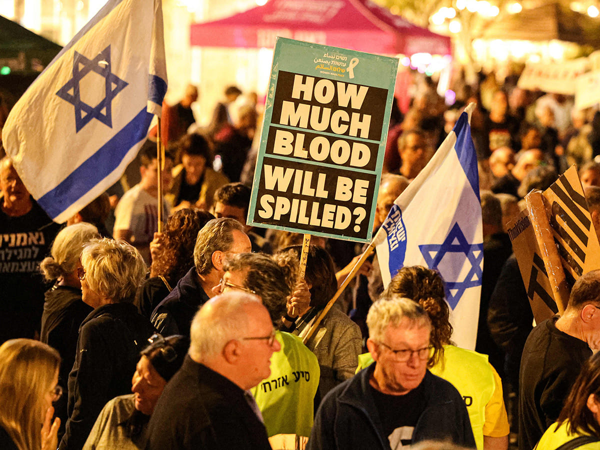 Israeli left-wing activists demonstrate in HaBima Square against the ongoing war with Iran and against the Israeli government in Tel Aviv on May 2, 2026. 